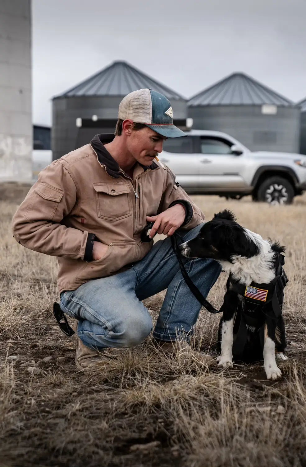 John Marine Veteran with service dog woody who is a black and white border collie