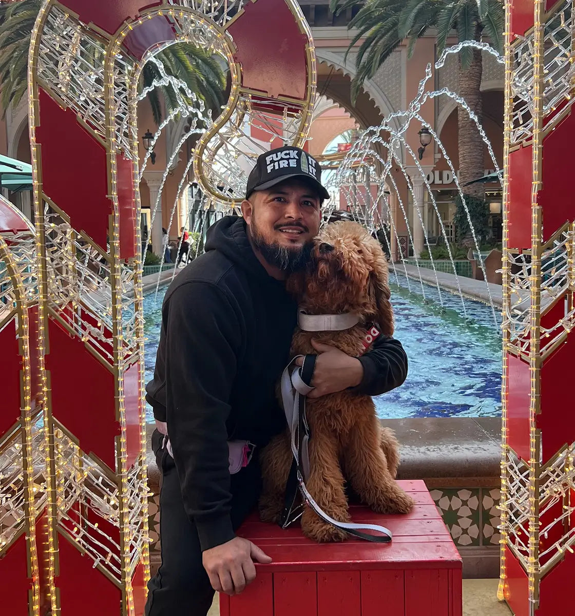 Marcos Marine Corps Veteran with Service dog Rebel a Labradoodle