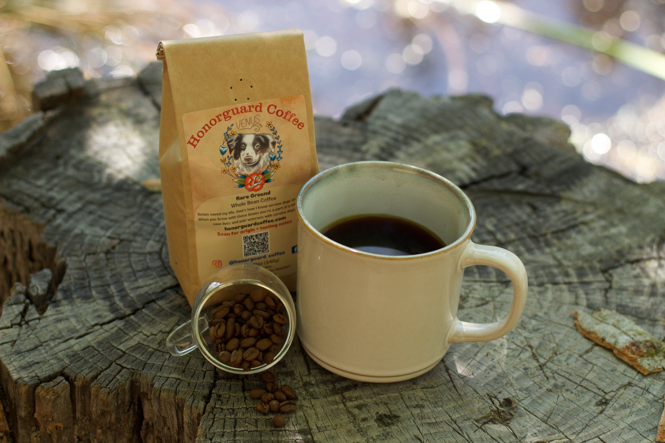 Honorhead Coffee package with a mug and coffee beans on a wooden surface